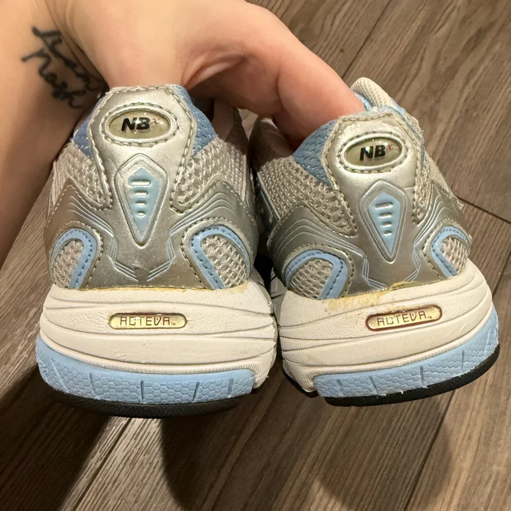 New Balance Women's Light Blue and Silver Running Sneakers